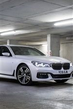 2015 BMW M7 white car stop at parking