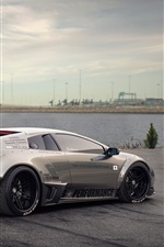 Lamborghini sports car, river, clouds