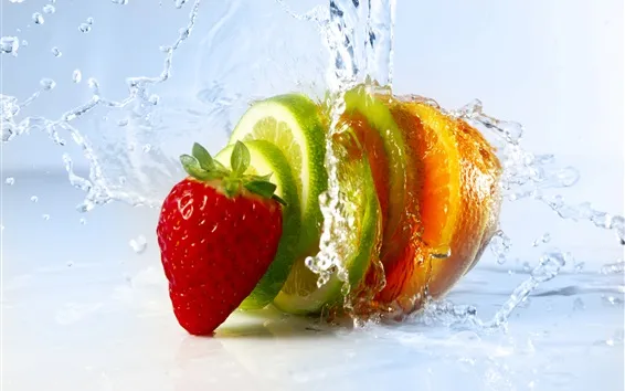Wallpaper Fruit slices, strawberry, lime, orange, water splash