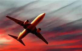 Aperçu fond d'écran Avion à coucher de soleil rouge