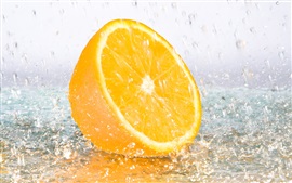 Preview wallpaper A half orange in rain